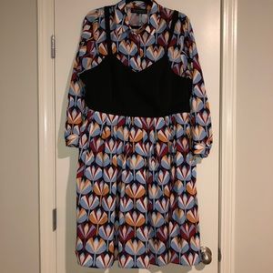 Multi-colored dress with attack black bustier.